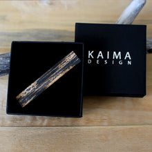 Kaima Designin Kelo-malliston musta solmiopidike, laserleikattu kotimaisesta koivuvanerista.