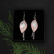 Bloom -malliston korvakorut koossa mini, joiden väriyhdistelmä on roosa ja hopea.